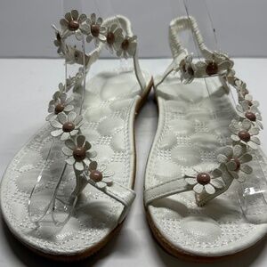 White sandals with flower straps